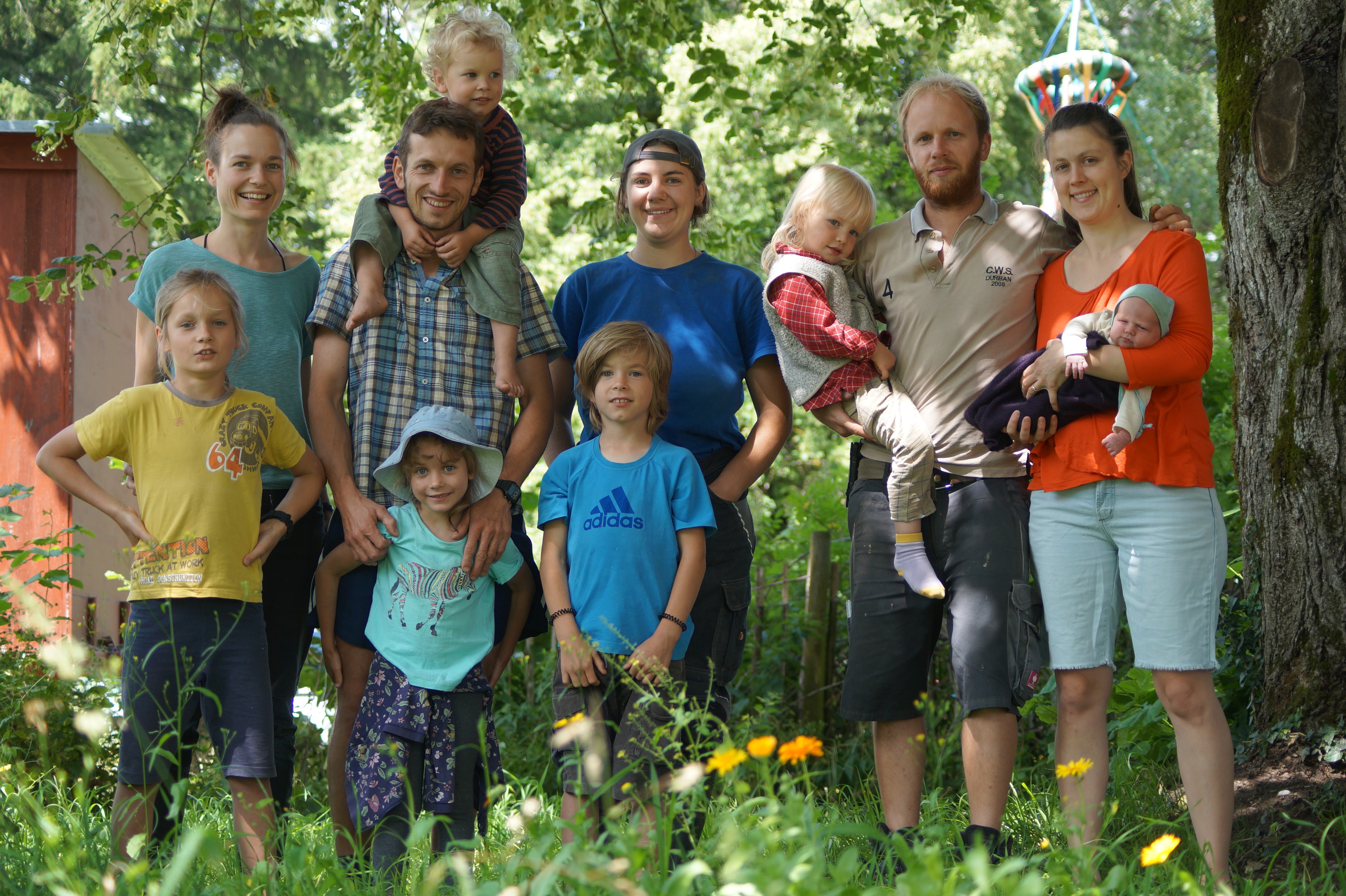 Gruppenfot der Landwirtfamilien
